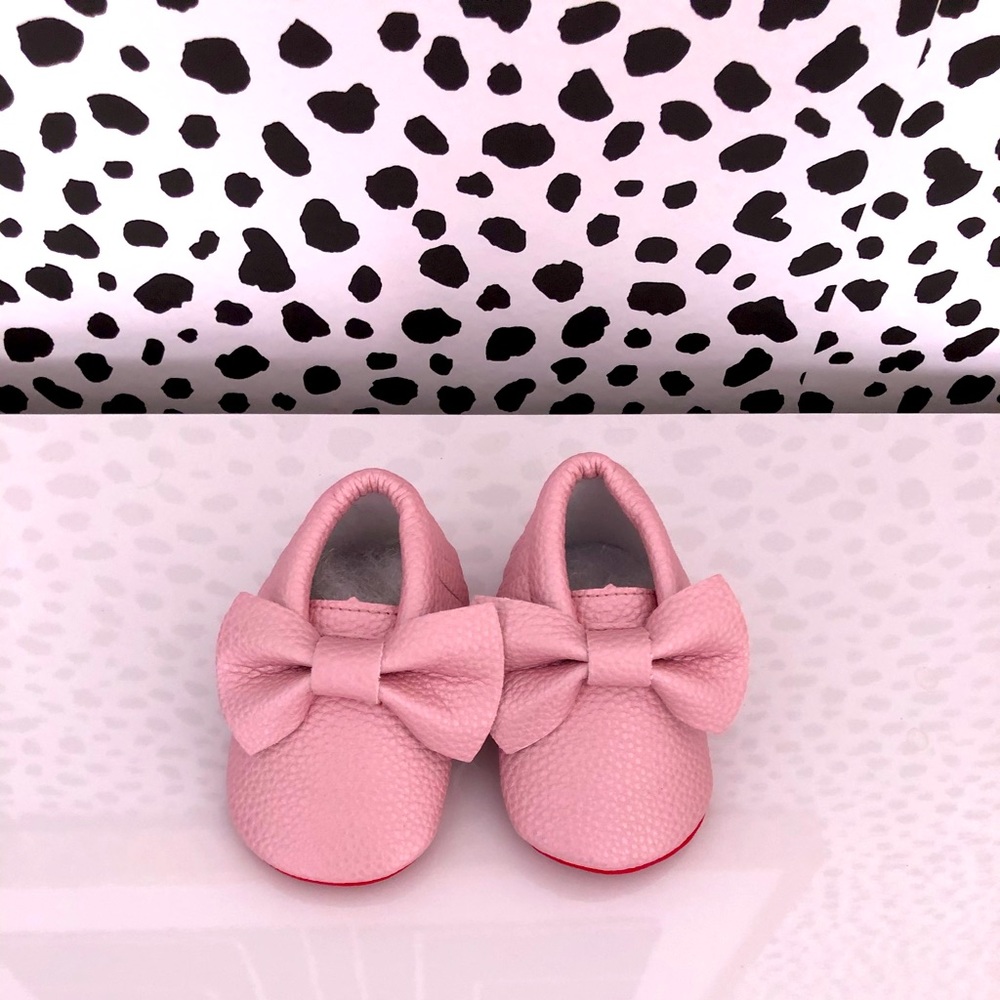 Pink baby shoes